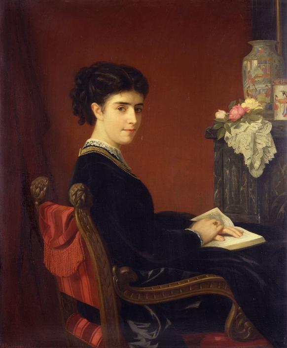 Sitzende Frau (Marianne Beschütz) mit aufgeschlagenem Buch auf ihrem Schoß.
