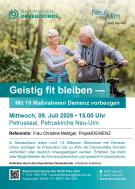 Seniorin und Senior im Wald. Er mit dem Fahrrad und Verweis auf die Veranstaltung am 08.07.26